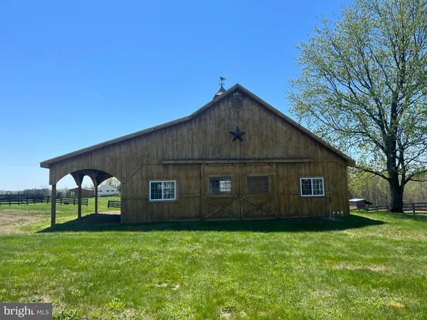 a view of a back yard of the house