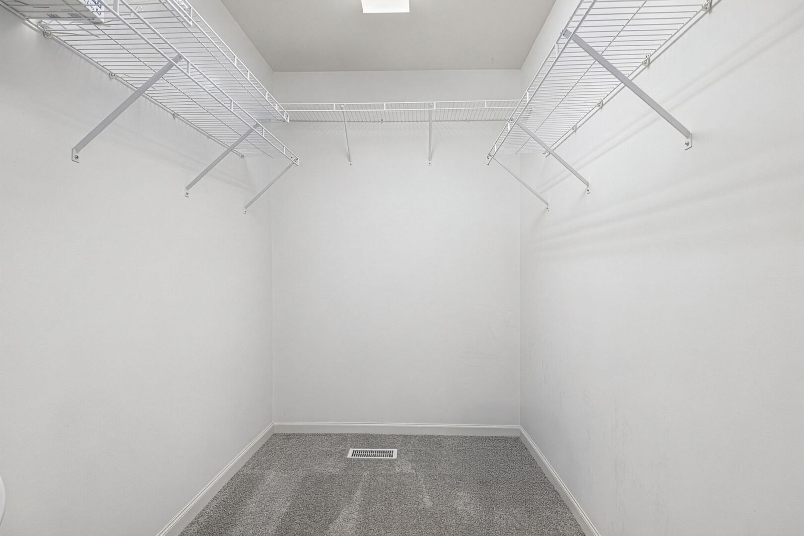 460 Valentine Way Oswego, IL 60543 - Photo 12 of 23 a view of a room with racks on the wall
