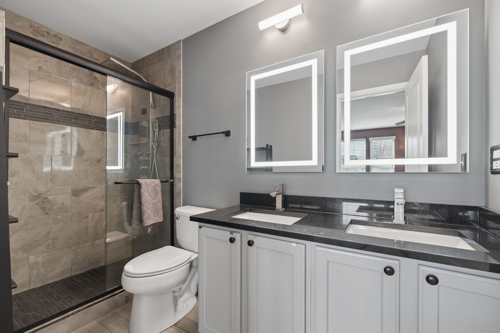 460 Valentine Way Oswego, IL 60543 - Photo 13 of 23 a bathroom with a granite countertop sink toilet and shower