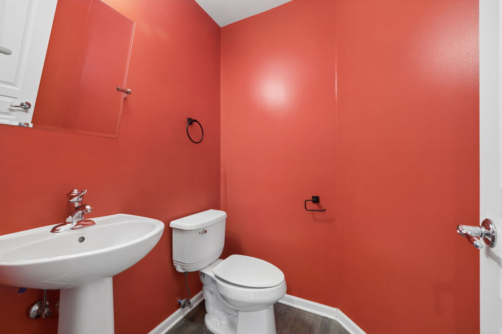 460 Valentine Way Oswego, IL 60543 - Photo 14 of 23 a bathroom with a sink a toilet and a mirror