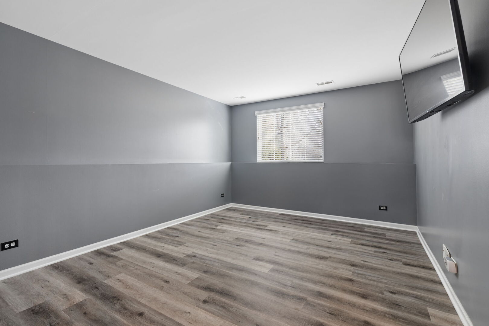 460 Valentine Way Oswego, IL 60543 - Photo 15 of 23 a view of an empty room with wooden floor and a window