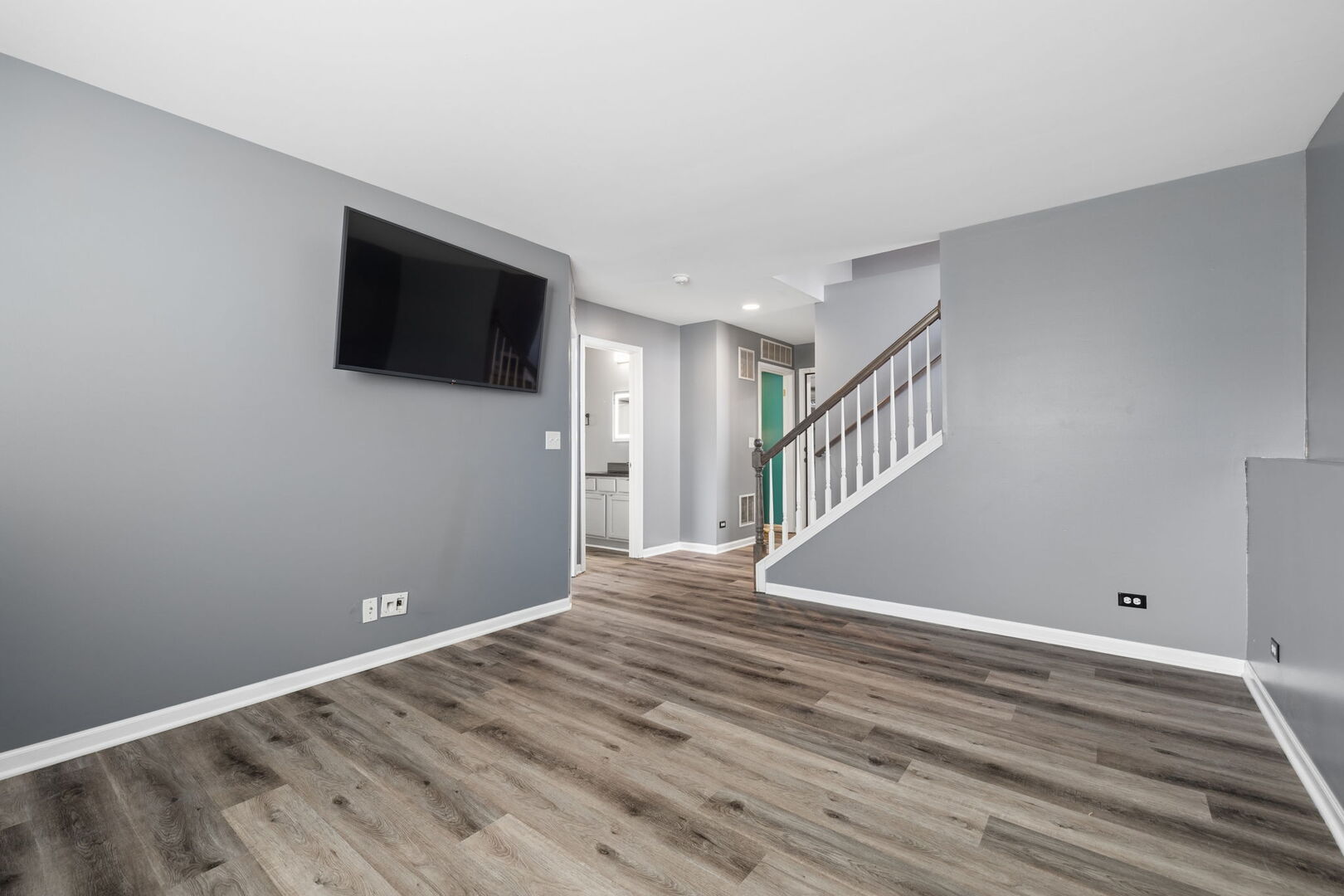 460 Valentine Way Oswego, IL 60543 - Photo 16 of 23 a view of an empty room with wooden floor and a window