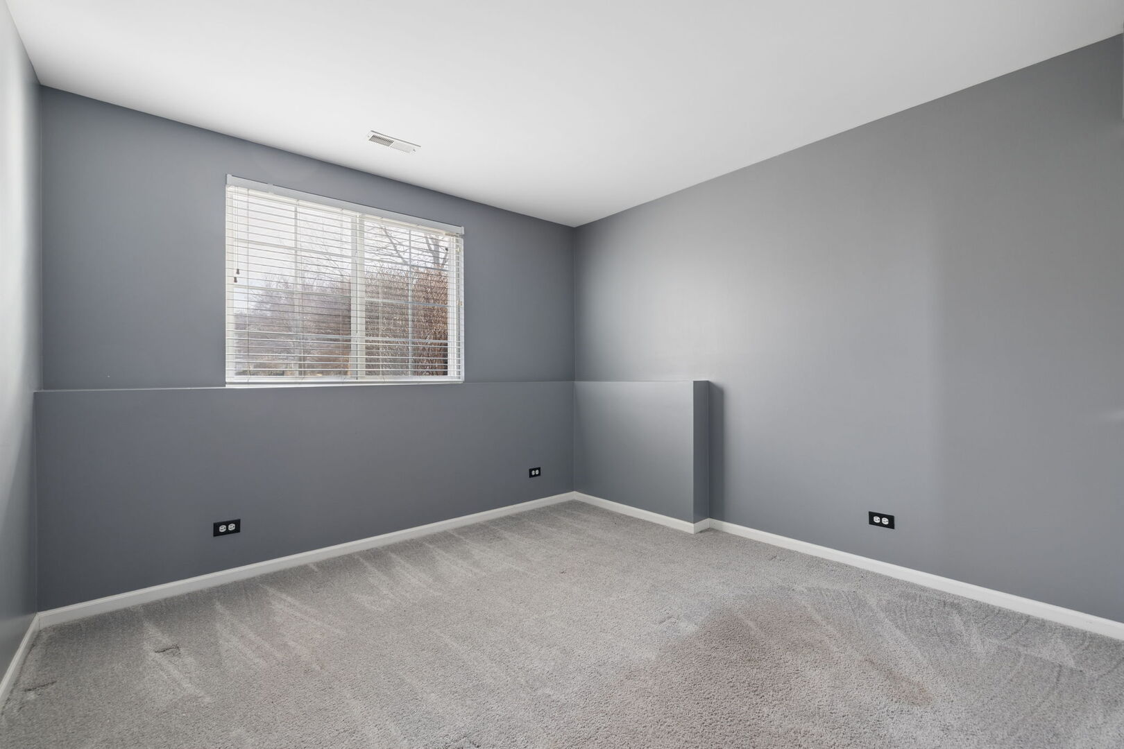 460 Valentine Way Oswego, IL 60543 - Photo 17 of 23 a view of an empty room with a window