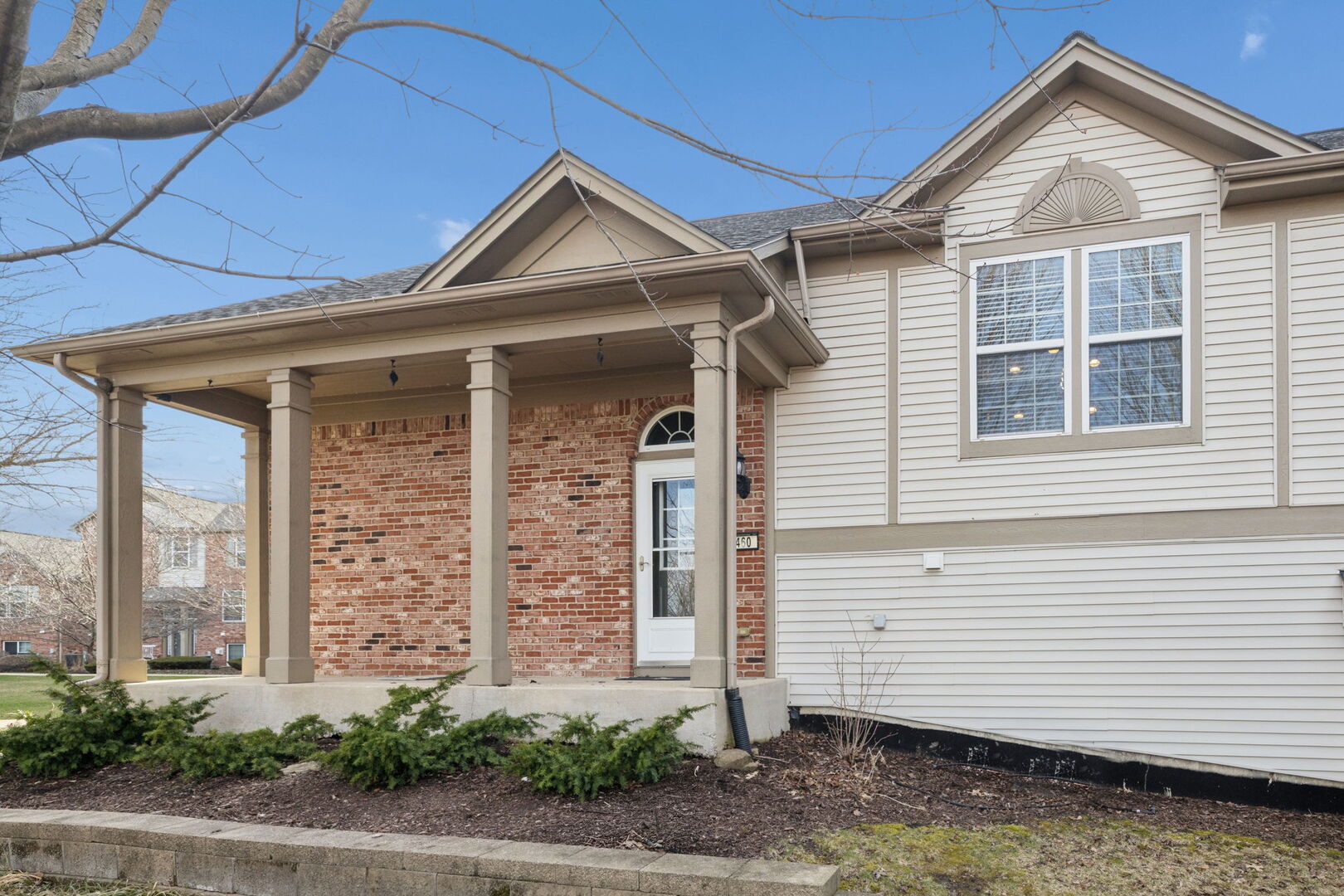460 Valentine Way Oswego, IL 60543 - Photo 2 of 23 a front view of a house with a yard