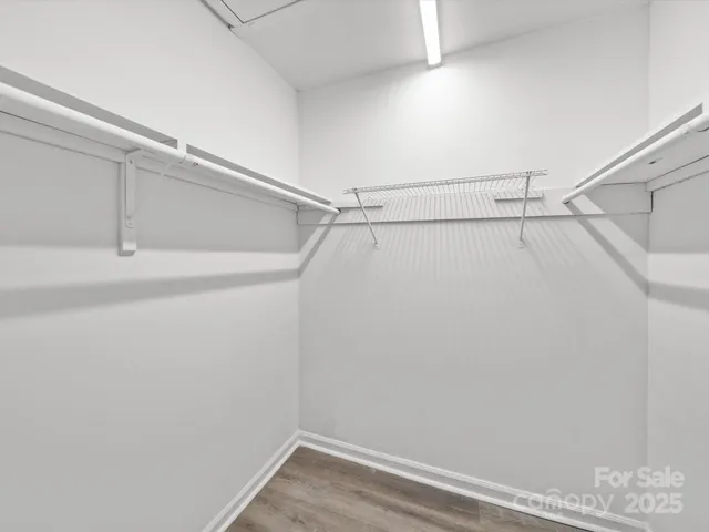 a view of a balcony with wooden floor