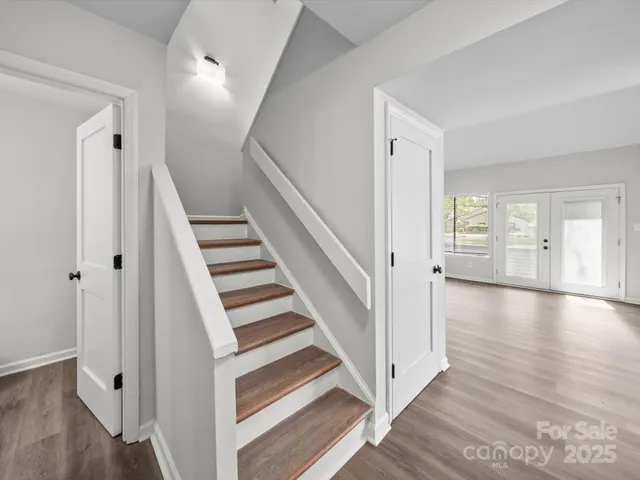 a view of an house with backyard space and garden