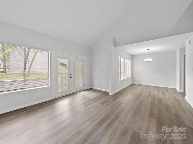 a kitchen with cabinets stainless steel appliances and a sink