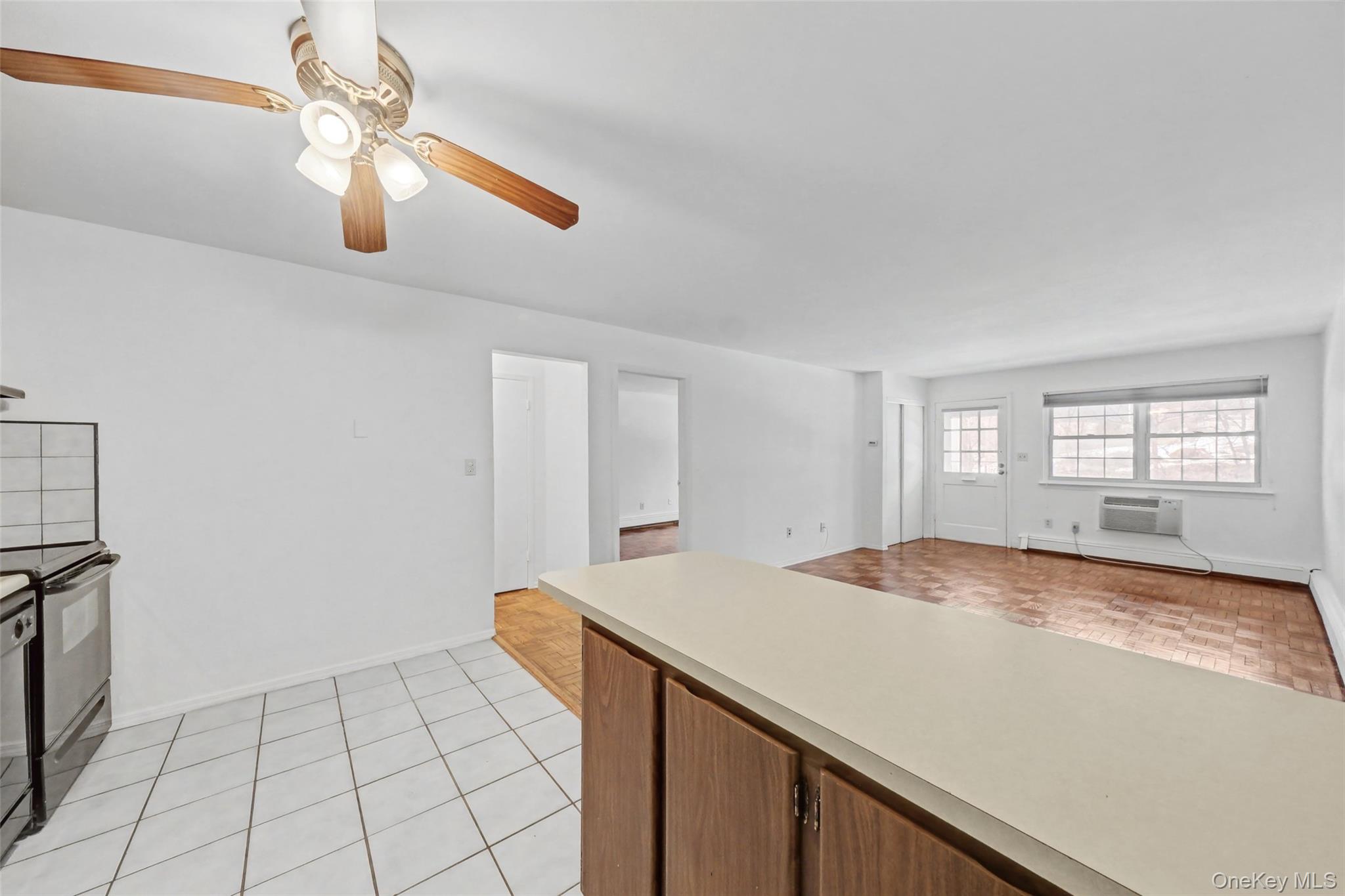 1840 Crompond Road, Unit 2A3 Peekskill, NY 10566 - Photo 11 of 22 a view of an empty room and window