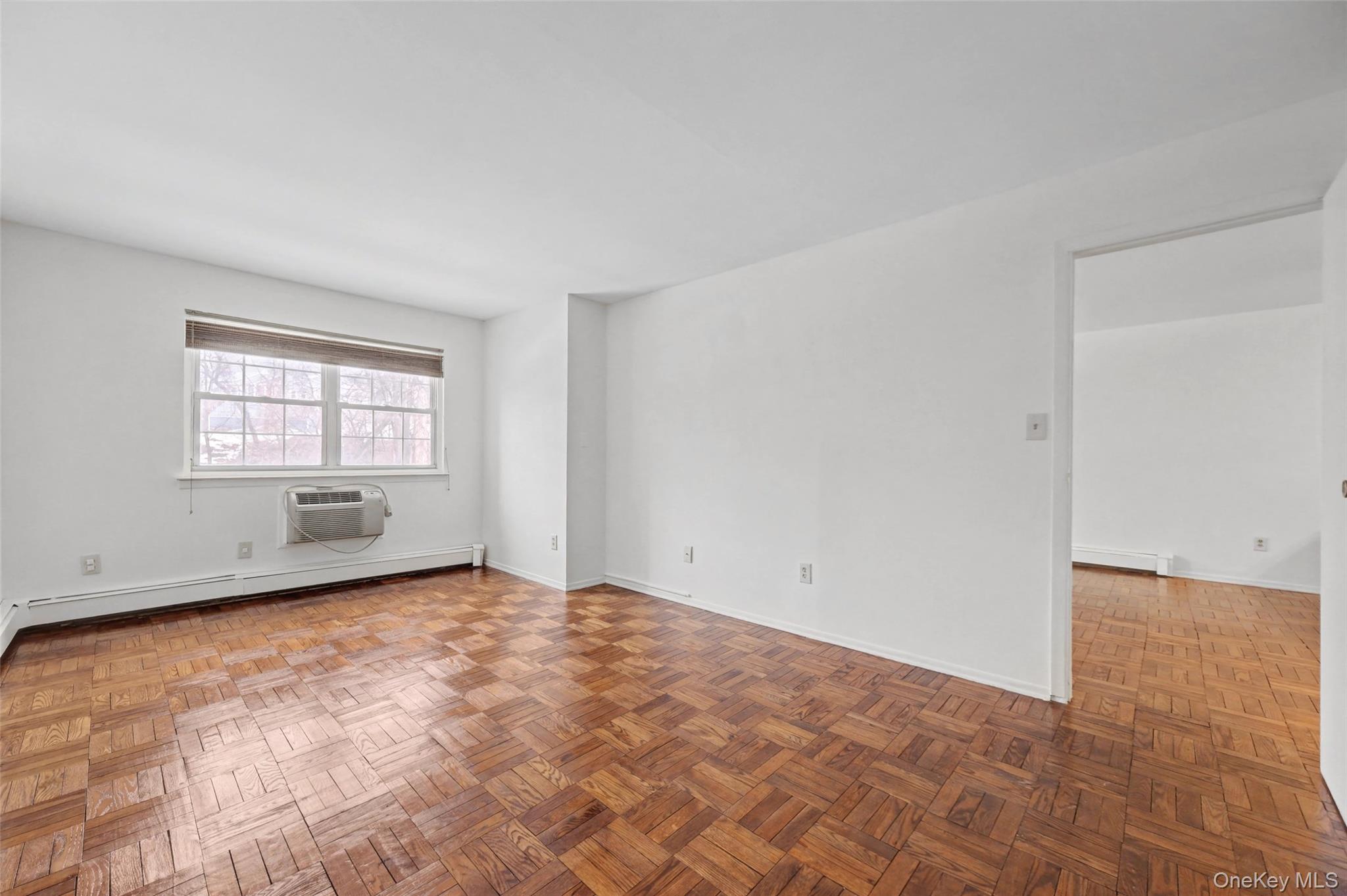 1840 Crompond Road, Unit 2A3 Peekskill, NY 10566 - Photo 12 of 22 an empty room with windows