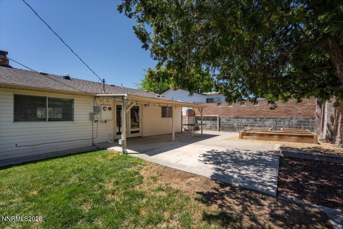 2205 Carlin Street Reno, NV 89503 - Photo 28 of 51 a view of a house with a yard