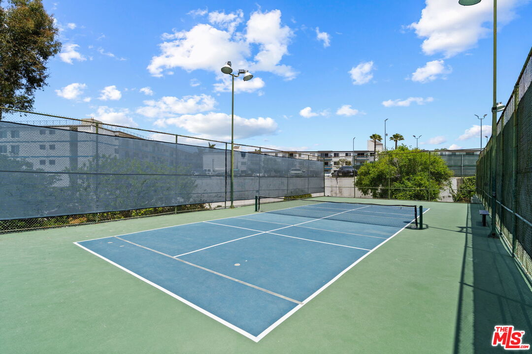 7765 West 91st Street, Unit F1110 Playa del Rey, CA 90293 - Photo 17 of 22 a view of a tennis court