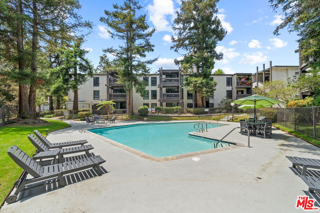 7765 West 91st Street, Unit F1110 Playa del Rey, CA 90293 - Photo 22 of 22 a view of outdoor space pool patio and outdoor seating