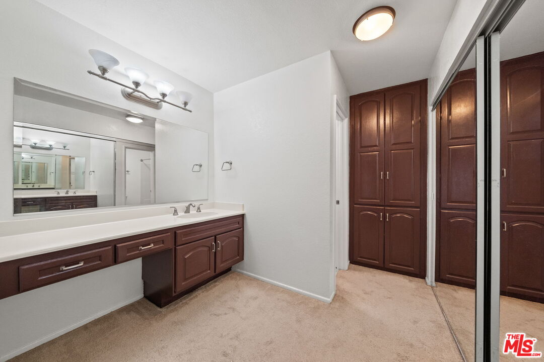 7765 West 91st Street, Unit F1110 Playa del Rey, CA 90293 - Photo 9 of 22 a large bathroom with a large tub and sink