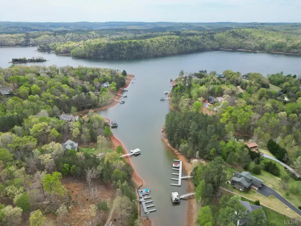 an aerial view of mountain with lake view