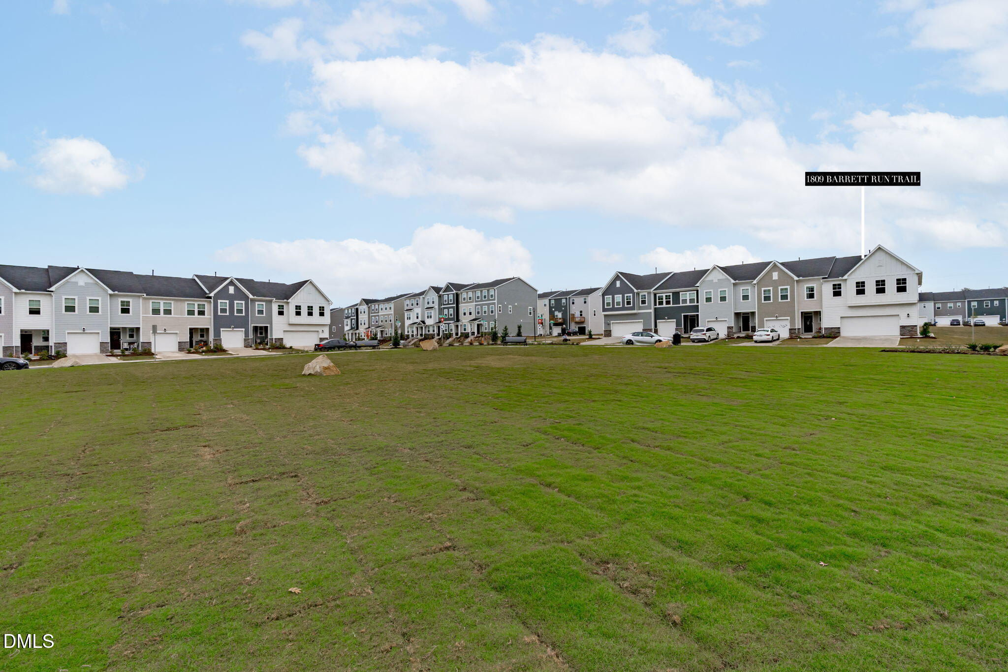 1809 Barrett Run Trail Apex, NC 27502 - Photo 36 of 37 a view of a city with an ocean and houses in the back
