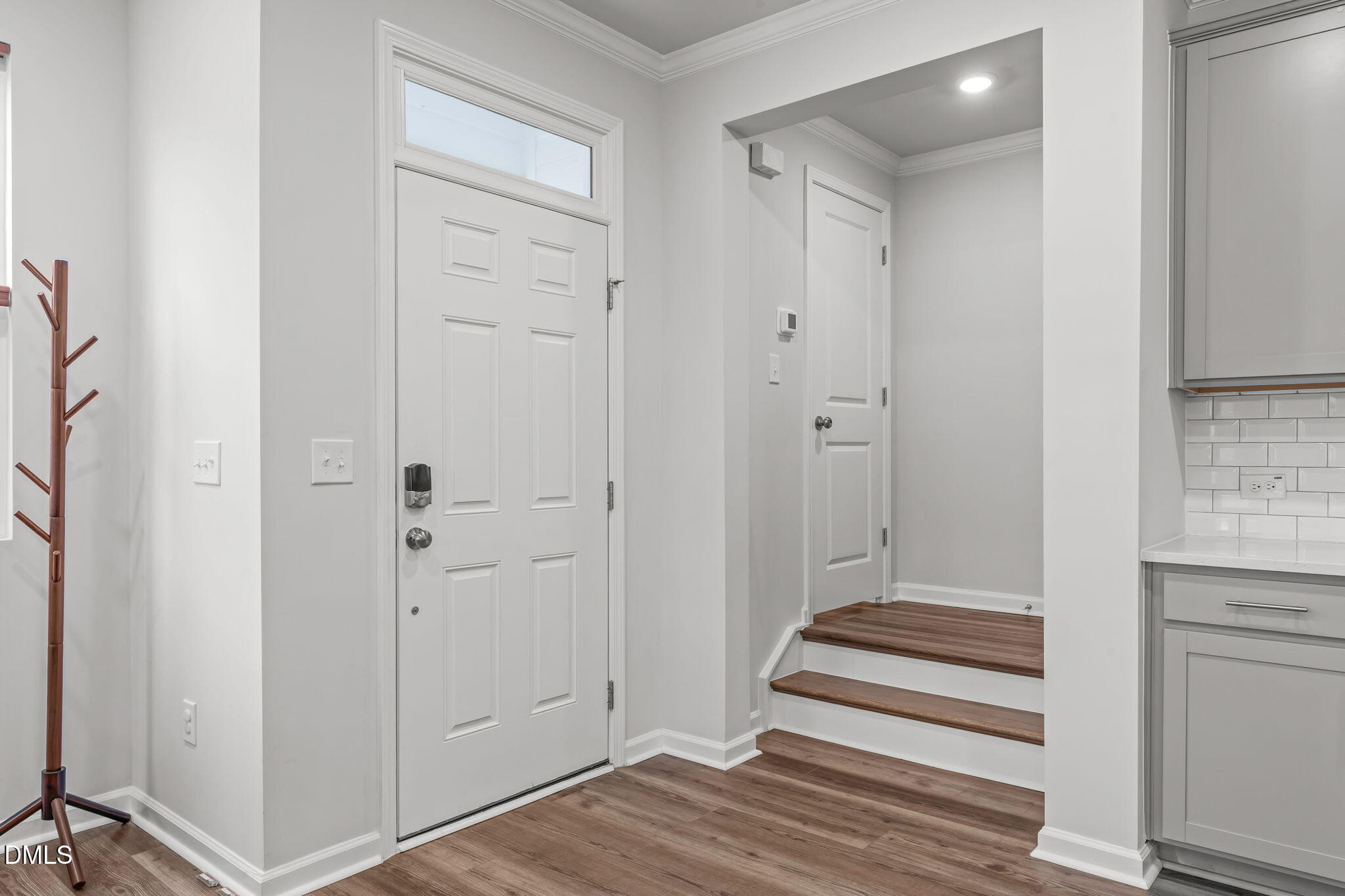 1809 Barrett Run Trail Apex, NC 27502 - Photo 4 of 37 a bathroom with a sink and a mirror