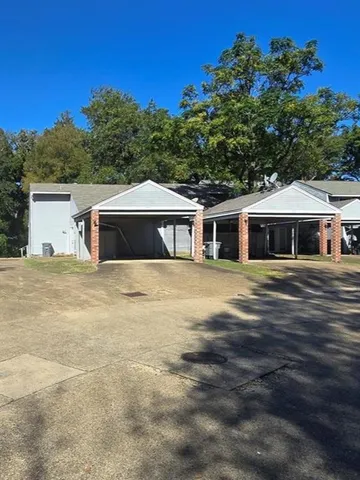 a house view with a outdoor space