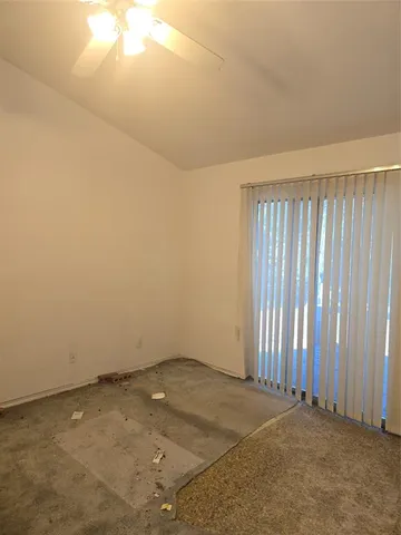 a bathroom with a double vanity sink mirror and a bathtub