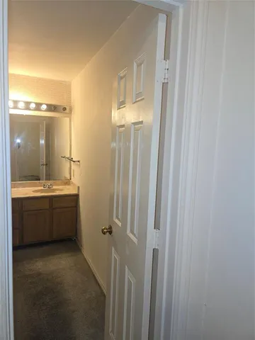 a view of empty room with windows