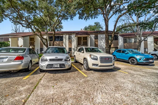 a car parked in front of a house