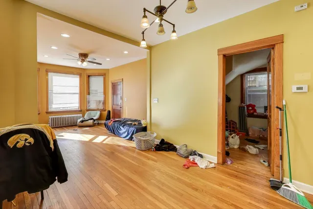 a bed room with a bed and a window