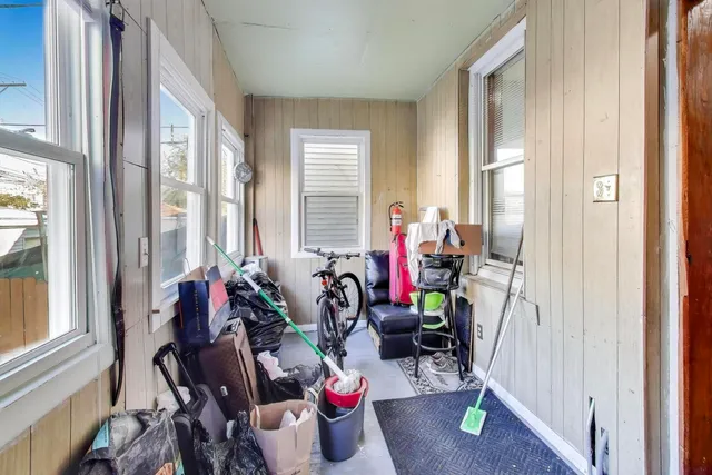 a view of dining room with furniture and wooden floor