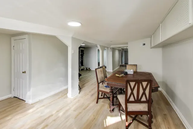 a kitchen with a stove and cabinets