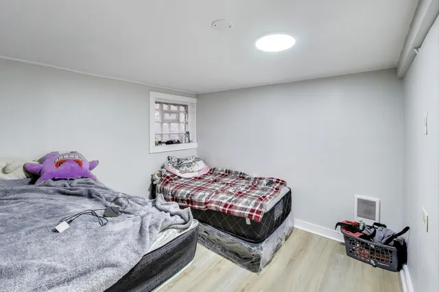 a room with a wooden floor and a table