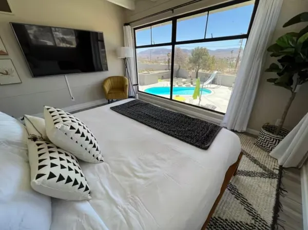 a view of a dining room with furniture window and outside view