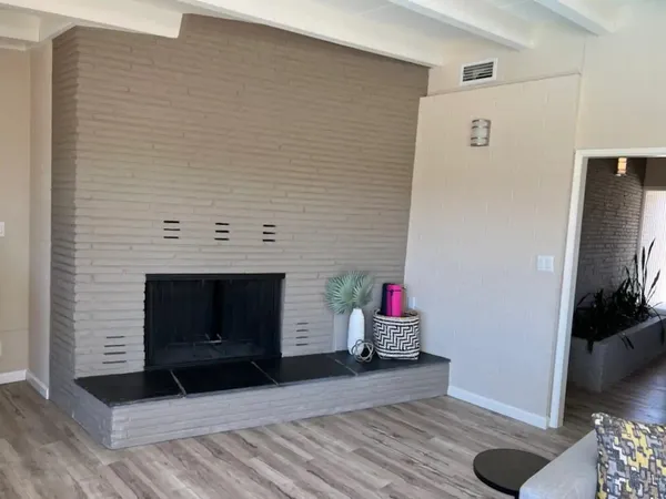 a bathroom with a sink vanity and mirror