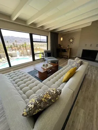 a living room with furniture and a couch