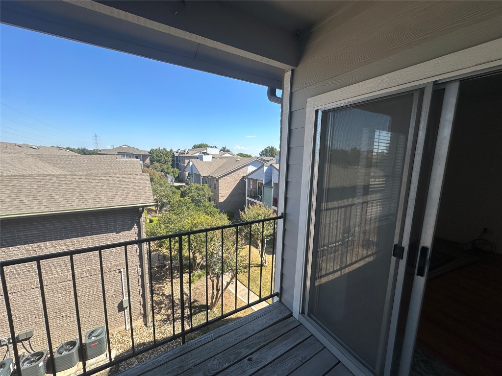12166 Metric Boulevard, Unit 339 Austin, TX 78758 - Photo 11 of 13 a view of balcony with furniture