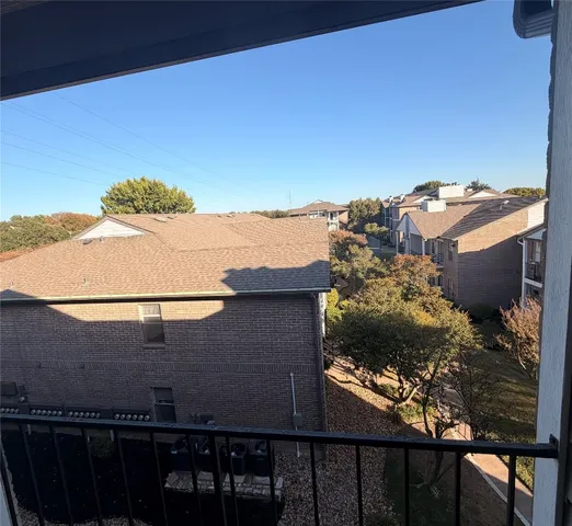 a view of a balcony with an outdoor space