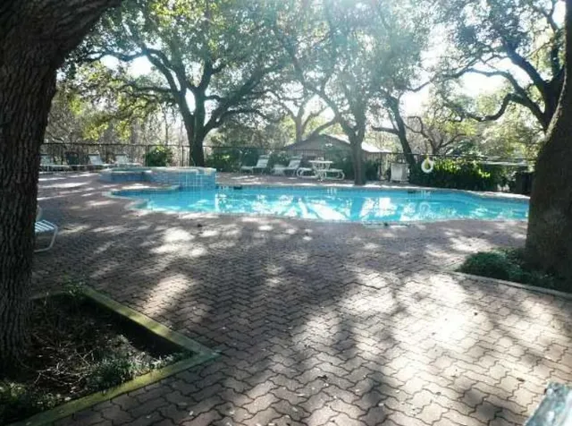 a view of backyard with green space