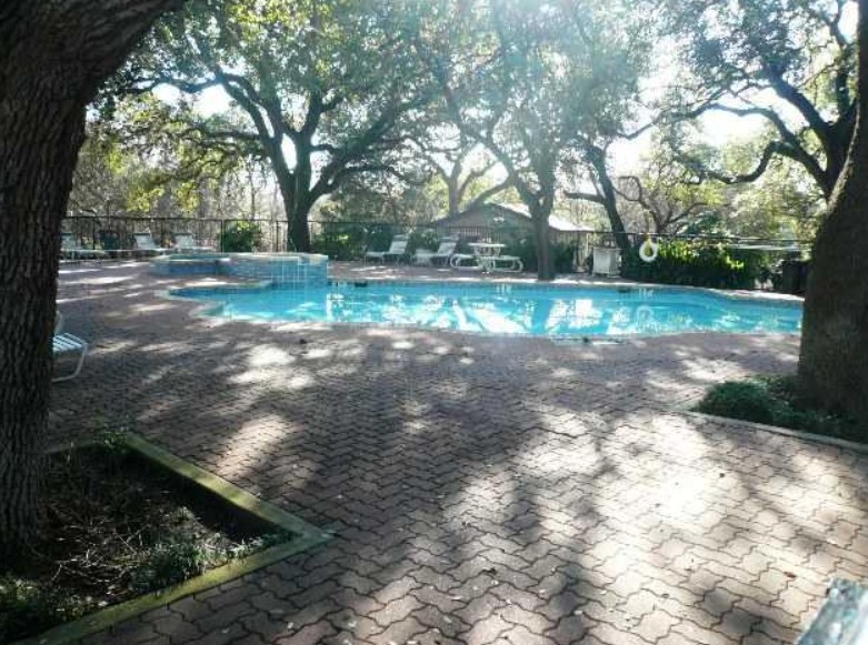 12166 Metric Boulevard, Unit 339 Austin, TX 78758 - Photo 13 of 13 a view of backyard with green space
