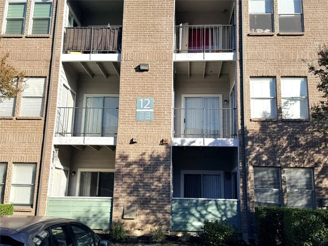 a front view of a house with glass windows