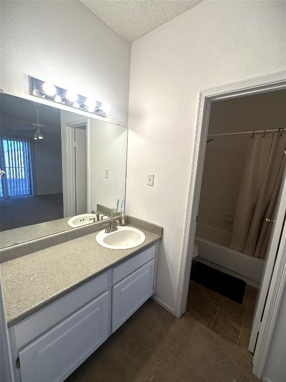 12166 Metric Boulevard, Unit 339 Austin, TX 78758 - Photo 9 of 13 a bathroom with a sink and a mirror