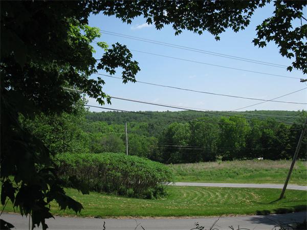 Lot C-1 Lot C-1 R Center Road Dudley, MA 01571 - Photo 3 of 5 a view of a field with a tree in the background