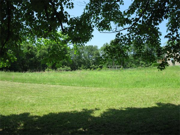 Lot C-1 Lot C-1 R Center Road Dudley, MA 01571 - Photo 4 of 5 a view of a green field with a tree