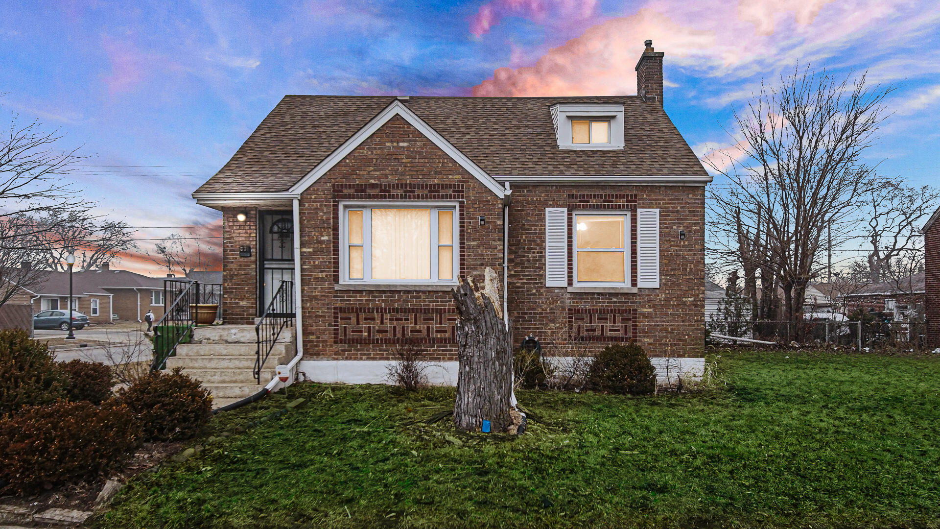 631 141st Street Hammond, IN 46327 - Photo 1 of 24 a front view of a house with garden