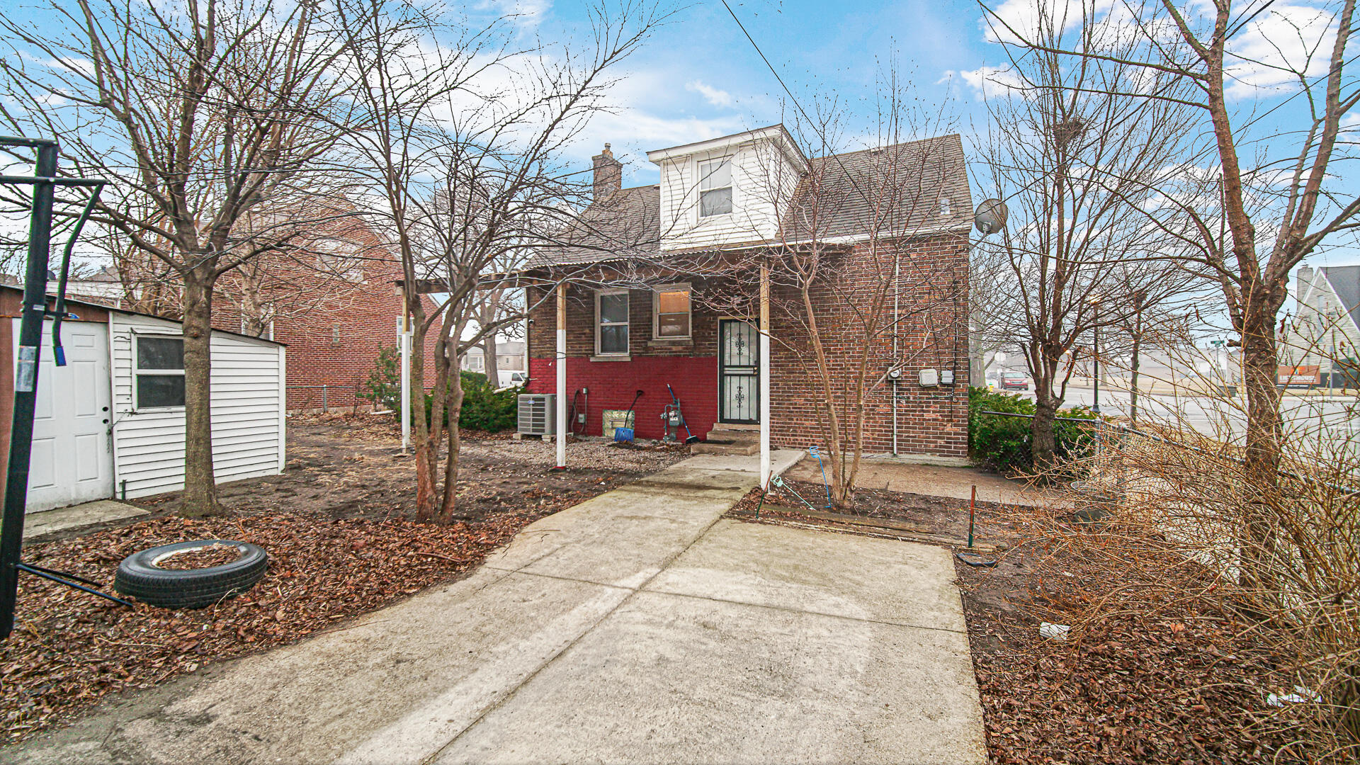 631 141st Street Hammond, IN 46327 - Photo 20 of 24 a view of a house with a yard and potted plants