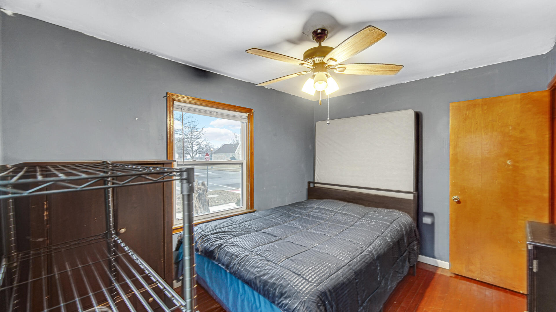 631 141st Street Hammond, IN 46327 - Photo 9 of 24 a bedroom with a bed and a window