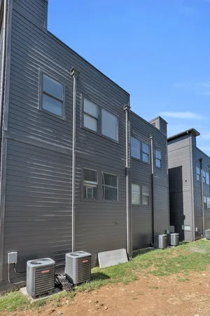 a backyard of a house with seating space