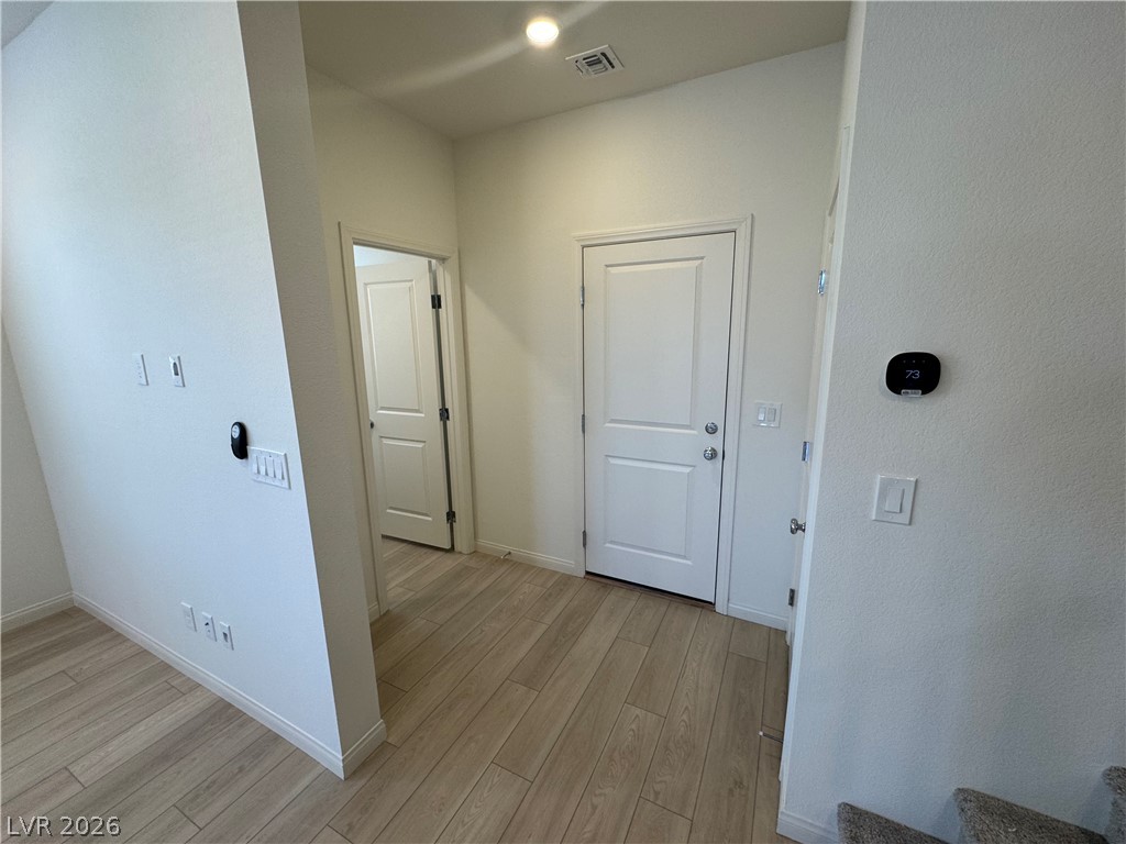 2821 Alcobaca Street Henderson, NV 89044 - Photo 6 of 24 Clean lines and light-toned flooring define this inviting entryway.