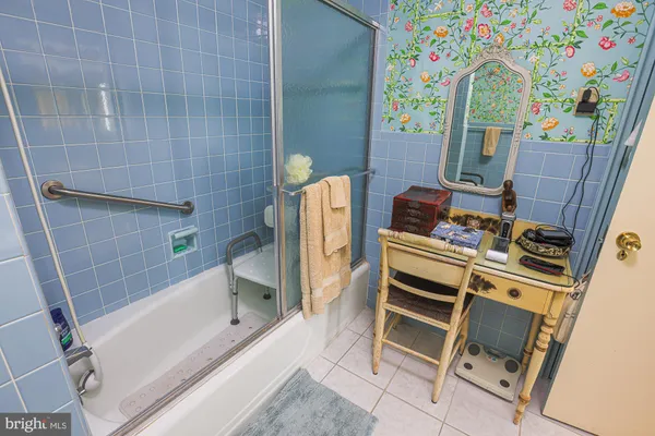 a bathroom with a sink toilet and vanity