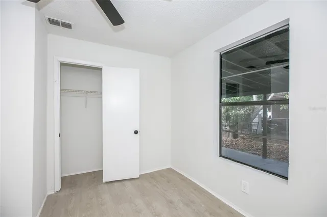 an empty room with mirror