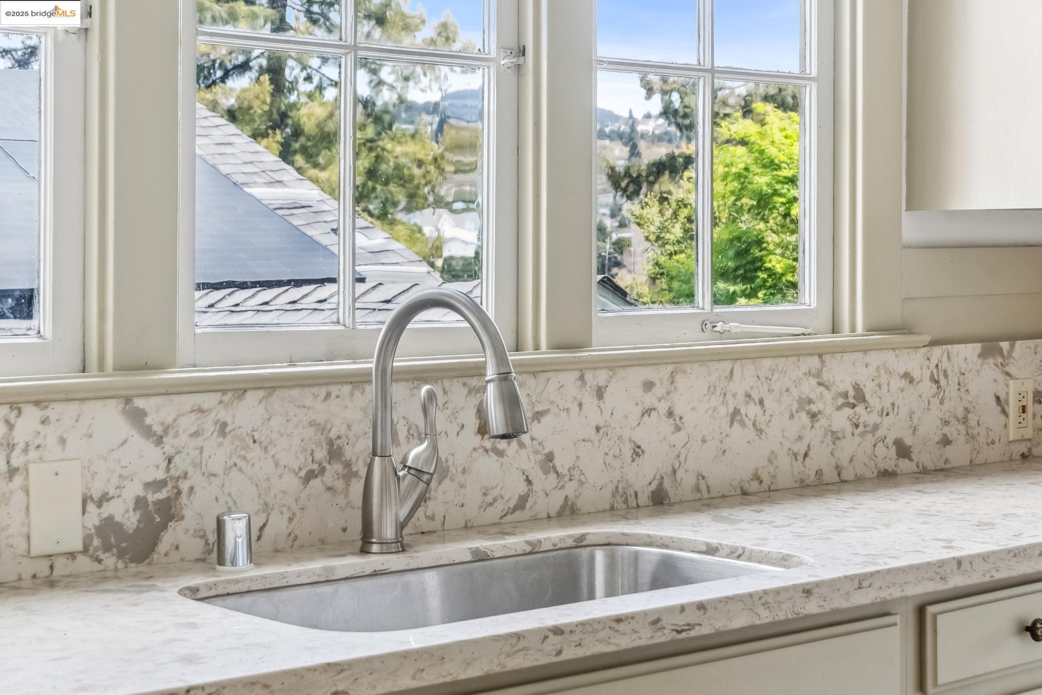 Undisclosed Address Oakland, CA 94610 - Photo 17 of 34 a close view of sink and tap
