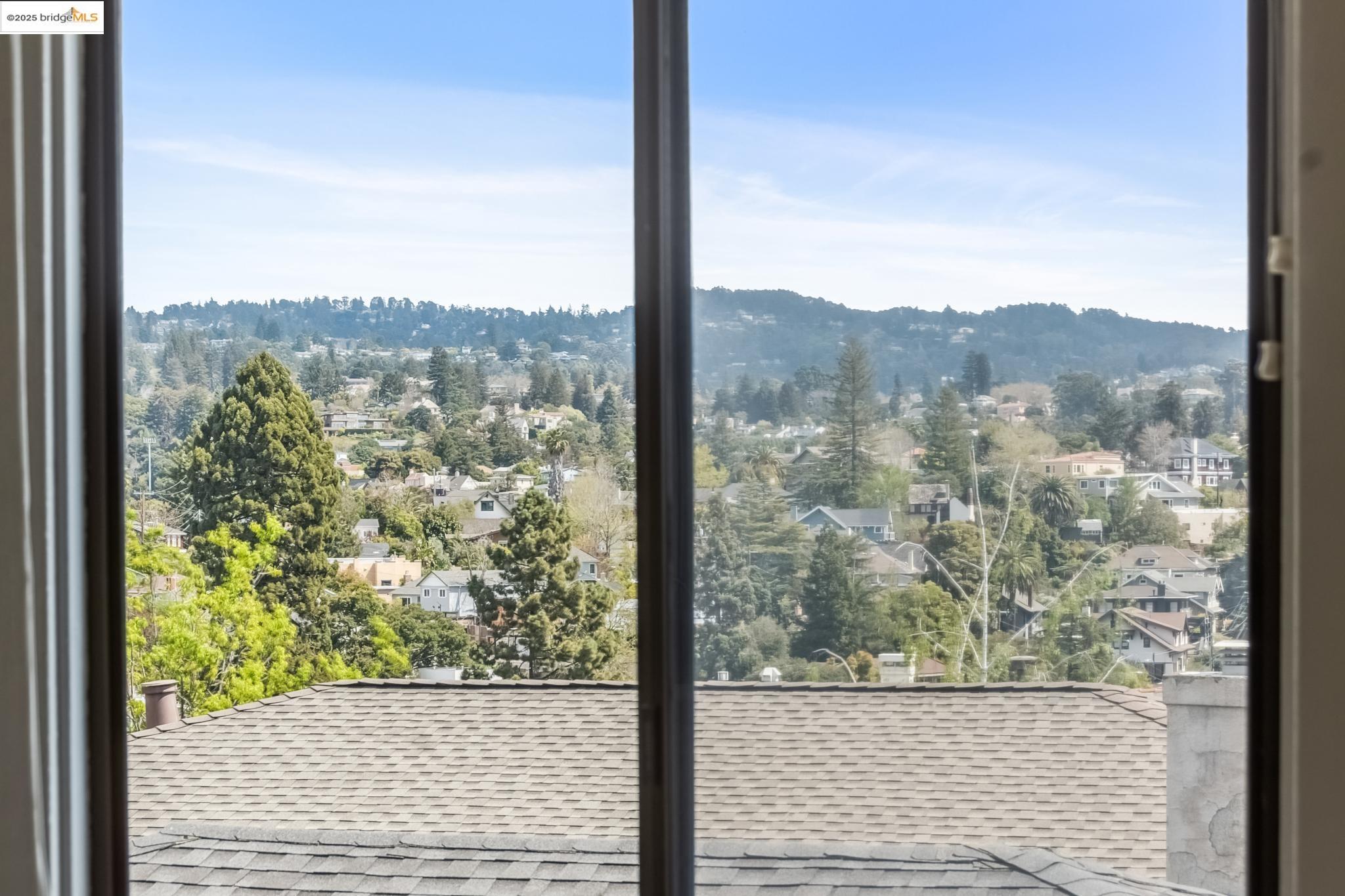 Undisclosed Address Oakland, CA 94610 - Photo 27 of 34 a view of a city from a window