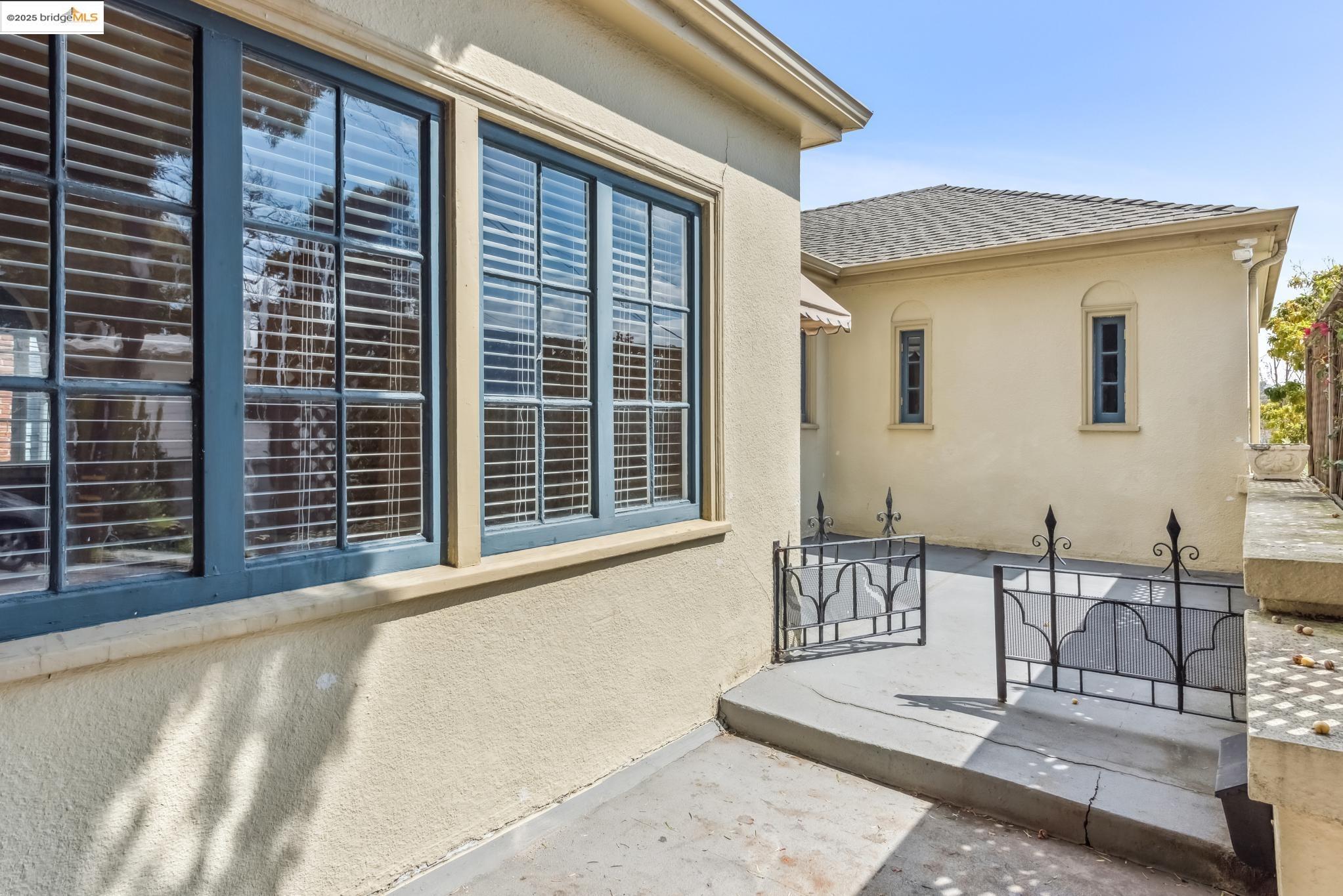 Undisclosed Address Oakland, CA 94610 - Photo 3 of 34 a view of a patio with a table and chairs