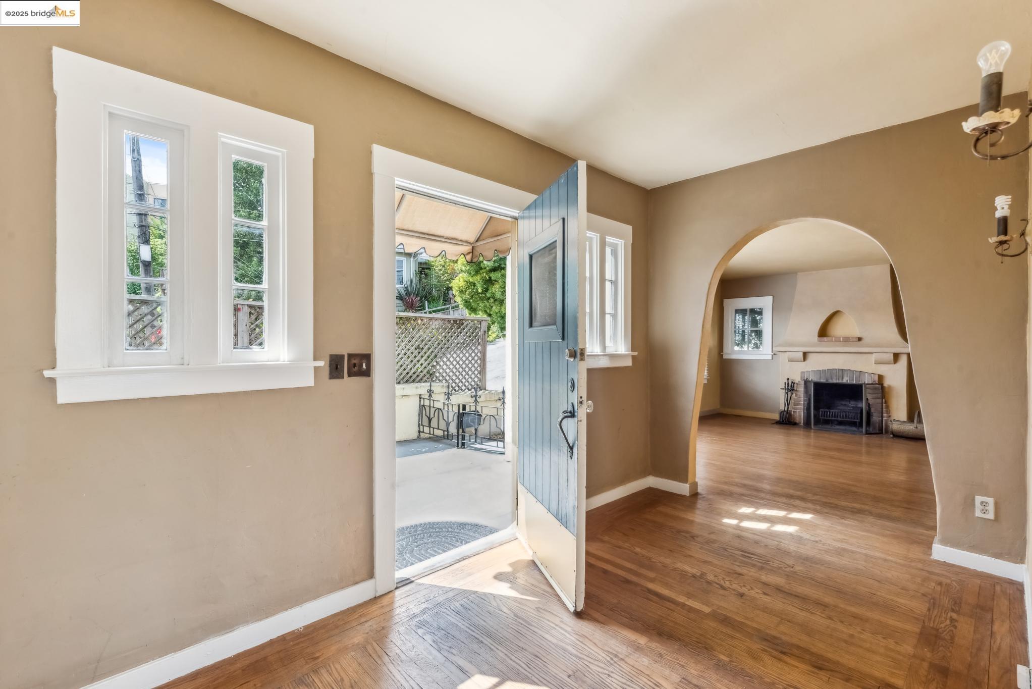 Undisclosed Address Oakland, CA 94610 - Photo 6 of 34 a view of livingroom with furniture and wooden floor